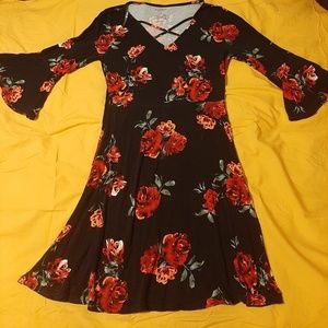 Black elbow length sleeved dress with roses